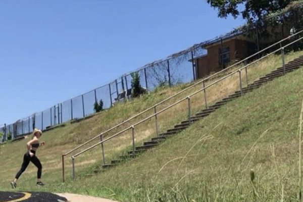 Kathryn Alexander doing HIIT (high intensity interval) training on stairs in Austin, Texas.