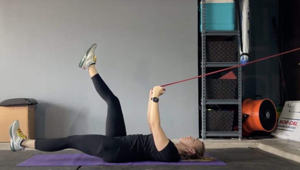 full body band workout at home: band ab work demonstrated by Austin personal trainer Kathryn Alexander