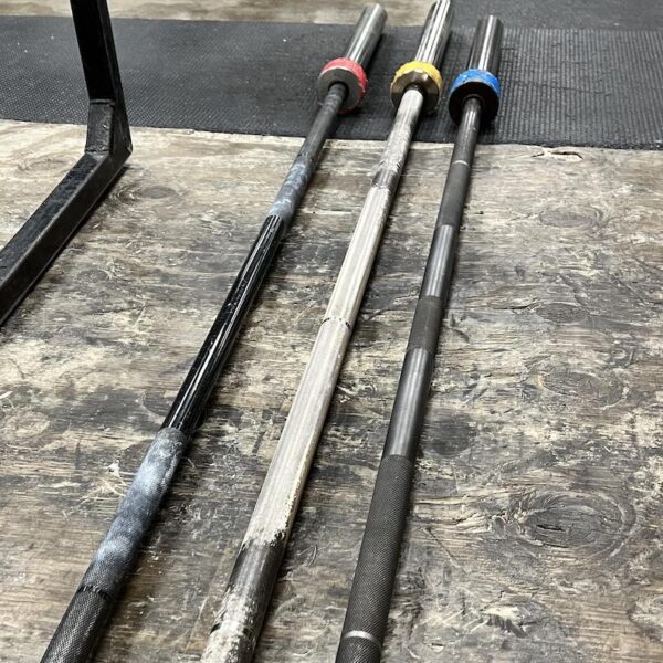 How Much Does a Barbell Weigh? Olympic and power bars