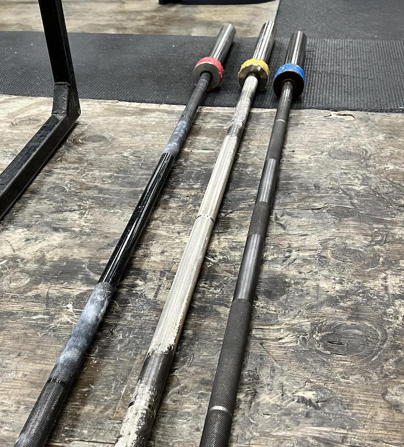 How Much Does a Barbell Weigh? Olympic and power bars